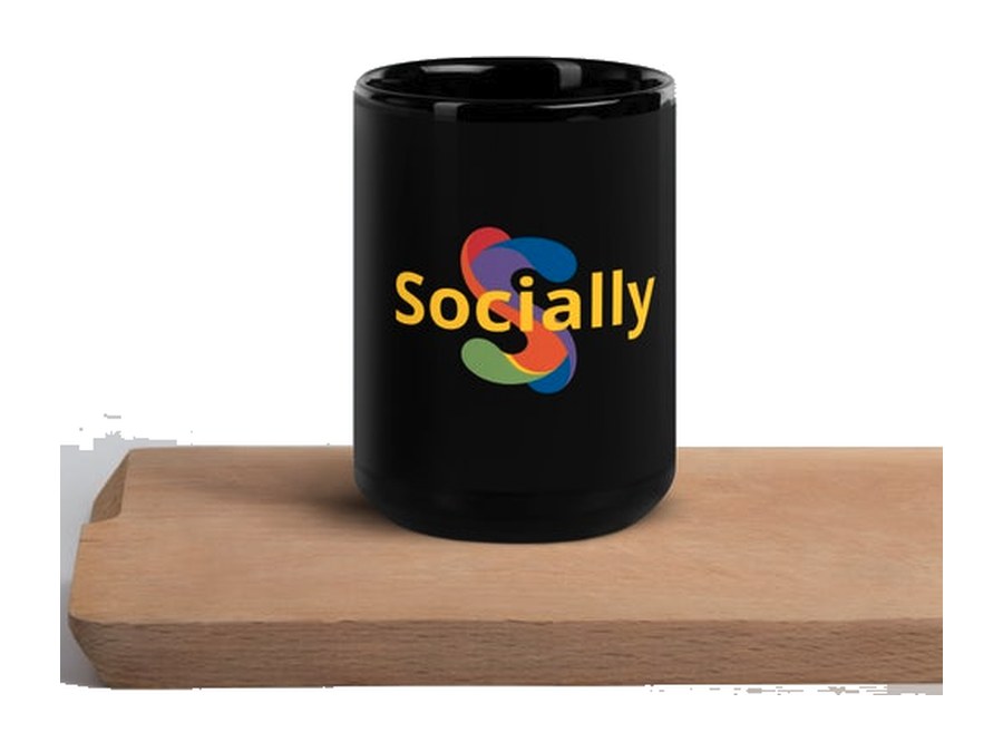 Black glossy Socially mug on a wooden board