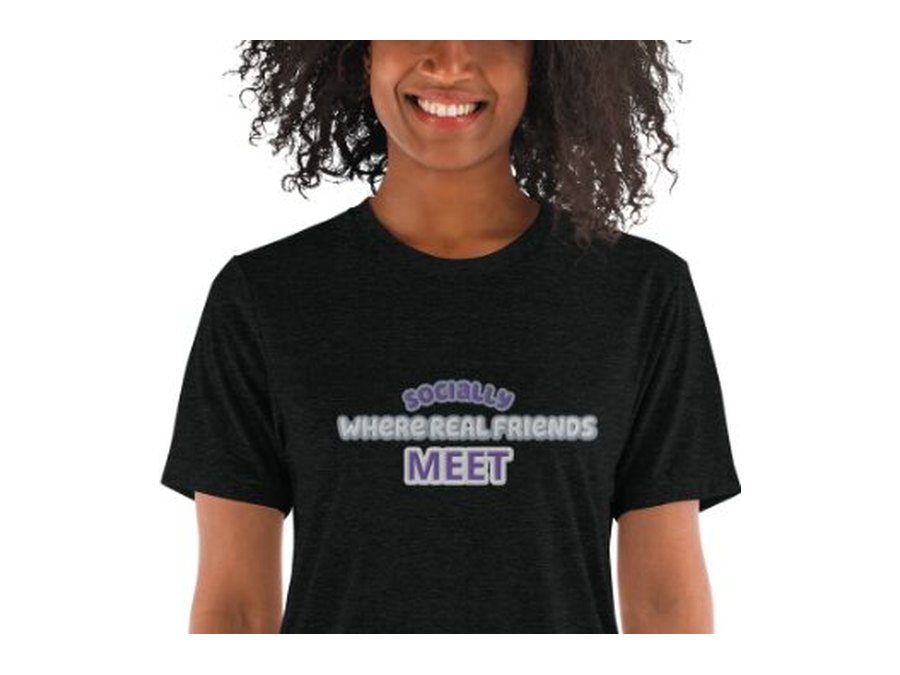 Black Socially tee reading Socially, Where Real Friends Meet, worn by a smiling model