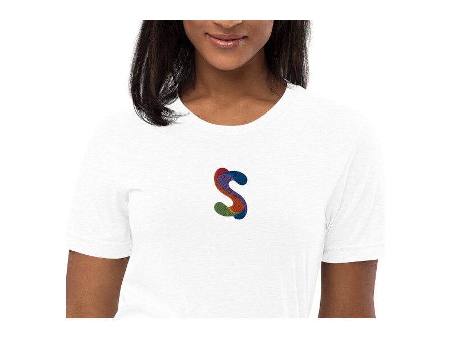 White Socially tee with the embroidered multicolour S centred on the chest
